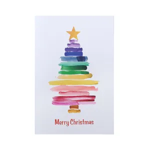 Watercolor rainbow Christmas tree greeting card with hand-painted star design