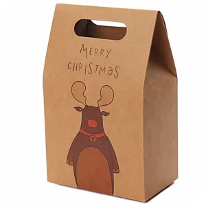 Boîte cadeau de Noël rétro en papier kraft brun avec illustration renne et poignée