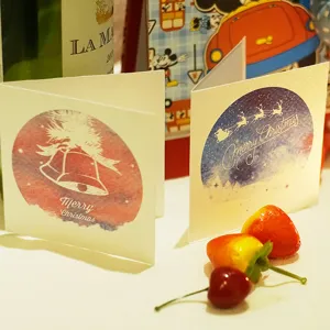 Cartes de vœux de Noël pliantes avec motifs de cloches étoilées et de rennes