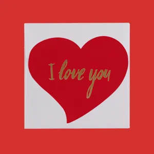Minimalist white square greeting card featuring a red heart with gold 'I love you' text.