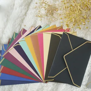 Multicolor pearlescent envelopes with gold foil borders for business wedding invites