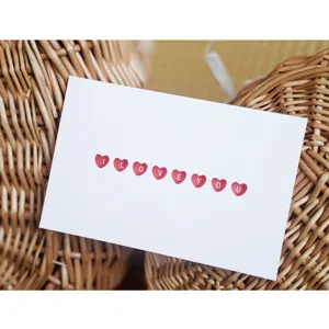 Elegant hollow heart-shaped greeting card with I Love You lettering for gift sets