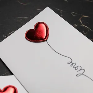 3D red leather heart greeting card for Valentine's Day with Love script detail