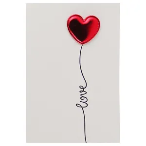 Minimalist greeting card with a 3D metallic red leather heart and love script