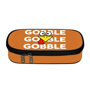 Großaufnahme des orangefarbenen Erntedankfest-Federmäppchens mit Gobble-Drucken!