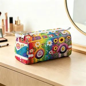 Vibrant colorful floral hippie bus makeup bag shown in a detailed lifestyle setting on a vanity.