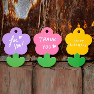 Set of creative flower-shaped gift tags with birthday and thank you message cards