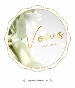 Close-up of elegant gold foil 'Vows' lettering on high-quality wedding vow card