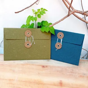 Creative retro string-tie specialty paper envelopes in olive green and navy blue