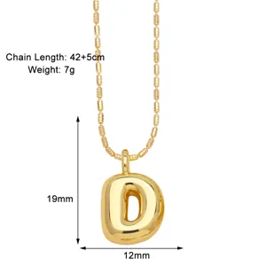 Close-up detail of the 18K gold plated puffed balloon letter D pendant necklace with beads chain.