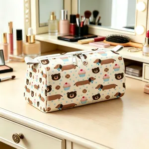 Detailed view of cosmetic bag with cute dachshund and cupcake prints on a vanity