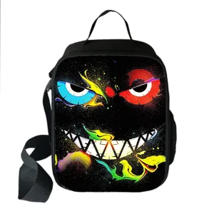 Macro detail view of vibrant monster face graffiti print on a portable insulated lunch bag