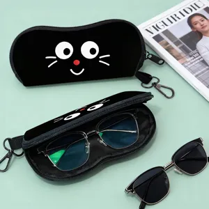 Close-up of portable cartoon cat eyeglass pouch with soft inner lining and hook