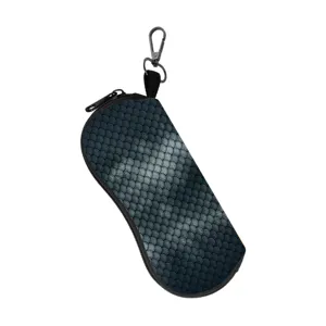 Detailed view of animal skin pattern sunglasses pouch with sturdy zipper and carabiner.