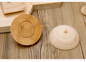 Wooden jewelry display prop detail shot, natural wood half-sphere showcase stand for retail.