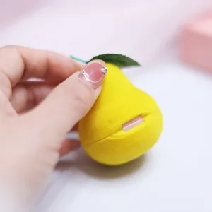 Cute pear shaped flocked jewelry box for rings and earrings gift packaging detail.