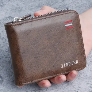 Macro detail view of a vintage brown leather men's wallet featuring JINPIER branding