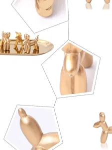 Close-up details of golden balloon dog resin ornament, perfect living room desktop decor.