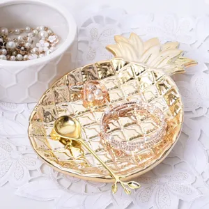 Nordic gold ceramic pineapple jewelry tray, elegant desktop storage plate for rings and bracelets.