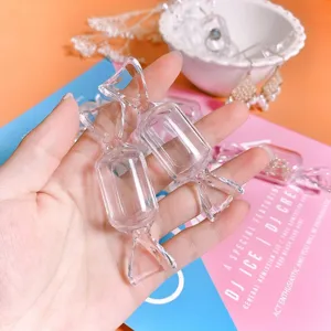 Clear candy shape jewelry storage box detail view, portable mini plastic accessory container.