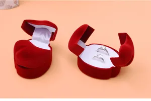 Red heart shaped velvet ring box for couples wedding jewelry storage display detail view