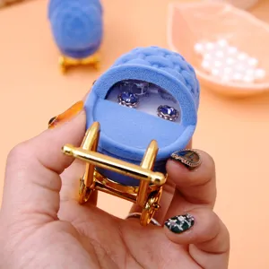 Blue velvet baby carriage jewelry box with golden handle for rings and earrings display