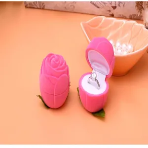 Pink velvet rose ring box for proposal, wedding ring packaging and romantic gift presentation.