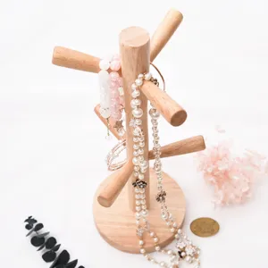 Wooden tree jewelry display stand for necklaces, bracelets, and mugs, elegant home decor.