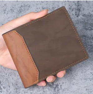 Macro view of a stylish two-tone brown men's short PU leather wallet with stitching