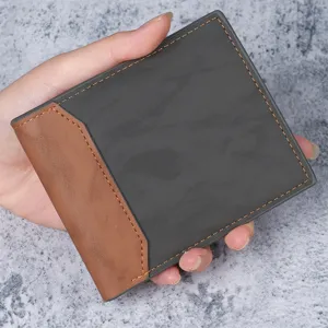 Close-up of a two-tone men's PU leather bifold wallet with orange stitching detail.