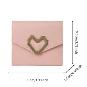 Minimalist compact pink PU leather wallet with gold heart buckle, dimensions 11x9.6x1.5 cm