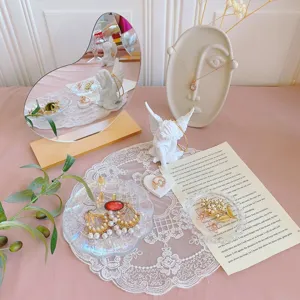 Ins style jewelry display props set including irregular mirror necklace stand and tray.
