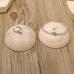 Solid wood semi-circular jewelry display stand for rings and bracelets photography props.