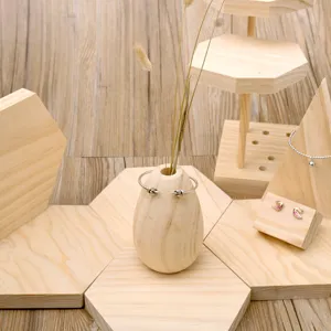 Wooden jewelry display stand set featuring a cute wooden vase and multi-tier props for store.
