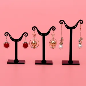 Zwarte acryl oorbellen display standhouder organisator voor sieraden winkel vitrine.
