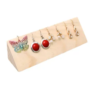 Solid wood jewelry display stand wedge shaped wooden earring holder rack for counter showcase retail display.