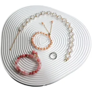 White wavy jewelry tray minimalist display plate for rings necklaces earrings photo props showcase.