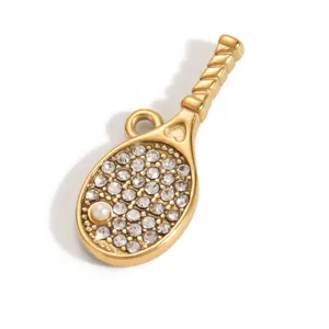 Close-up of gold-plated stainless steel tennis racket pendant with crystals and pearl