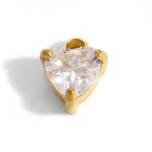 Close-up detail of a heart-shaped clear cubic zirconia pendant with 18K gold plating.