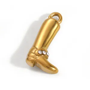 Detailed view of gold-plated stainless steel boot pendant with sparkling rhinestones.