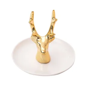 Main view of a creative gold deer head ceramic jewelry tray, perfect ring and earring dish.