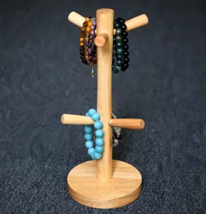Solid wood jewelry display stand, wooden bracelet and necklace holder for retail desktop storage.