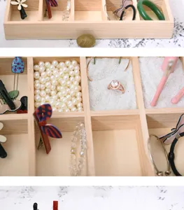 Wooden jewelry organizer box with multi-compartments for rings, earrings, and bracelets.