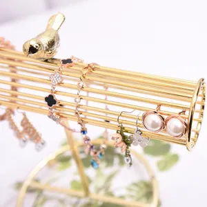 Soporte de exhibición de joyería dorado nórdico con pájaro pulseras y pendientes