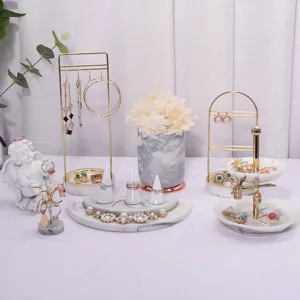 Nordic marble pattern jewelry display stand set, elegant gold metal and white organizer.
