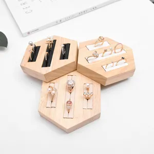 Solid wood hexagonal ring display stand jewelry organizer holder for desktop home retail store use.