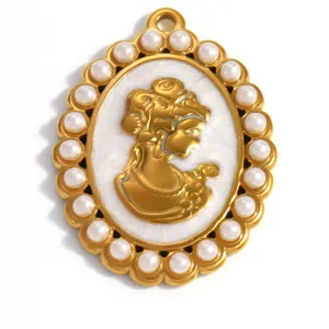 Detail of vintage lady cameo pendant with pearl border in 18K gold plated stainless steel.