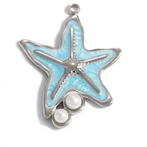 Close-up of stainless steel starfish pendant with blue enamel and two pearls.