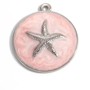 Detailed macro view of a pink enamel starfish pendant charm made of stainless steel