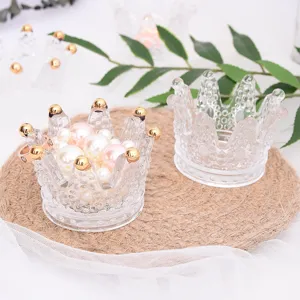 Clear glass crown jewelry storage jar and candle holder home decor aesthetic tabletop display.